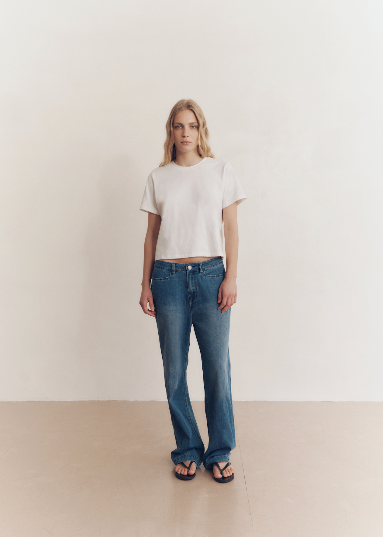 Model wearing Dani Jeans in Coastal Blue — low rise women's jeans, All My Love