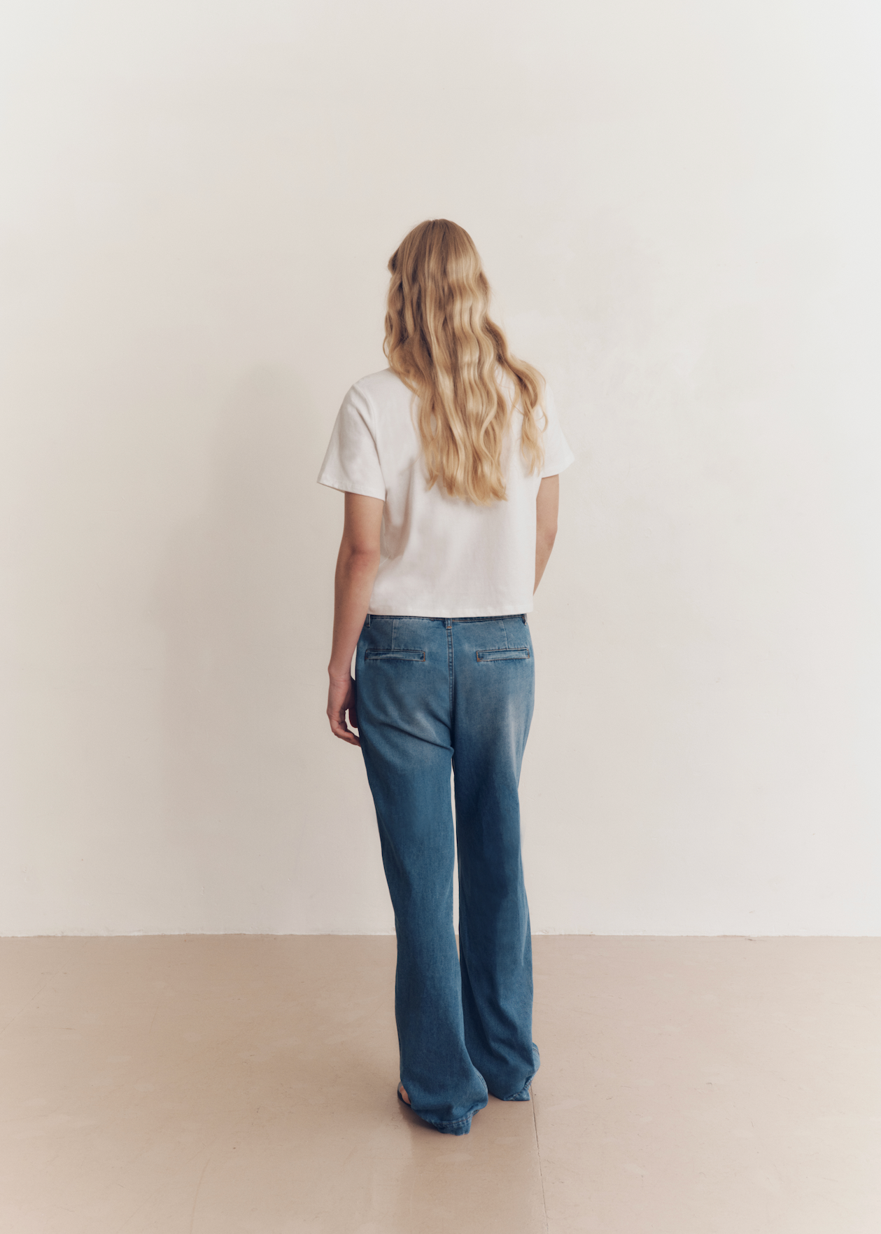 Model wearing Dani Jeans in Coastal Blue — low rise women's jeans, All My Love