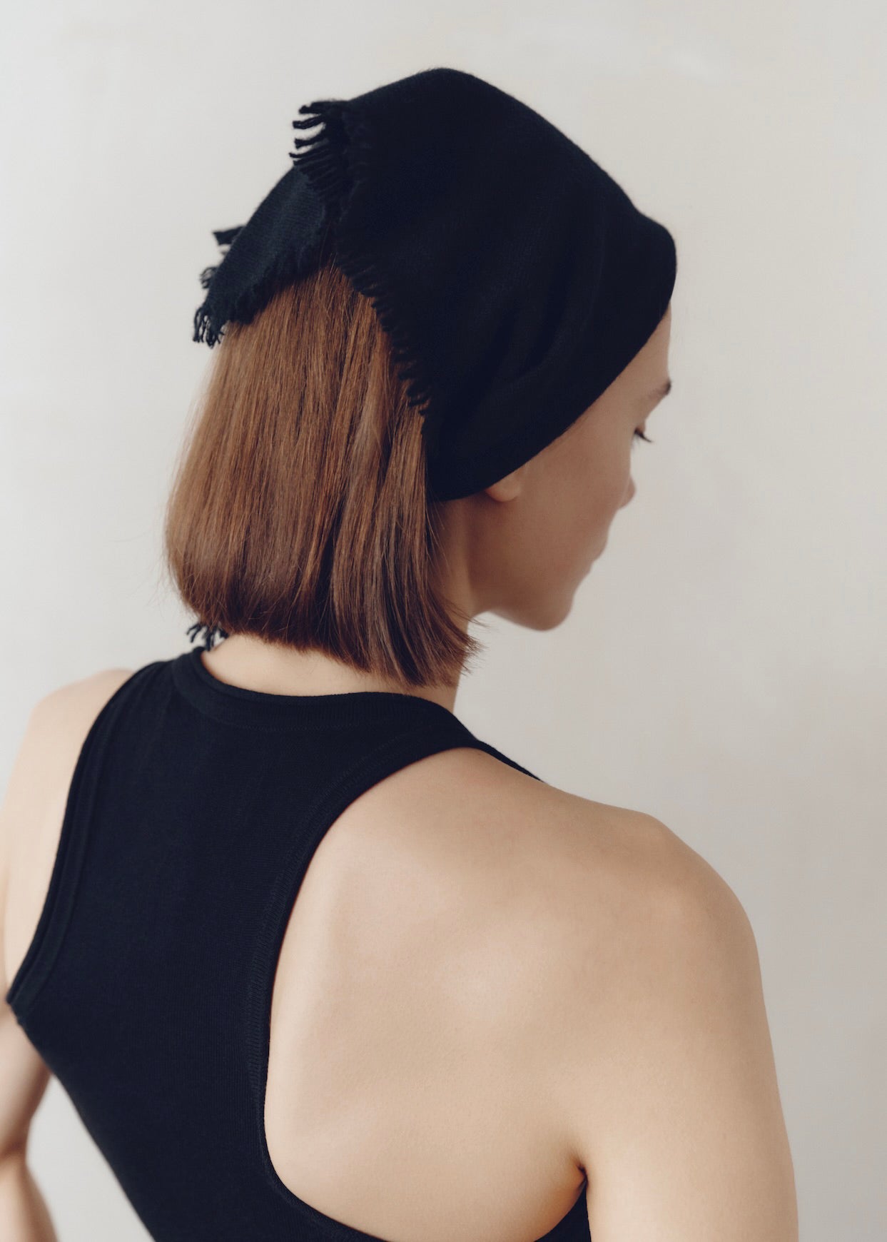 Model wearing Jess Shawl in Onyx — cashmere head scarf, All My Love